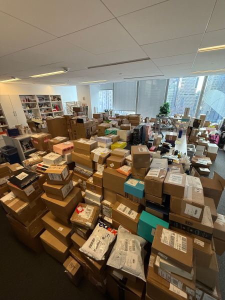 Image may contain Box Cardboard Carton Package Package Delivery Person and Indoors